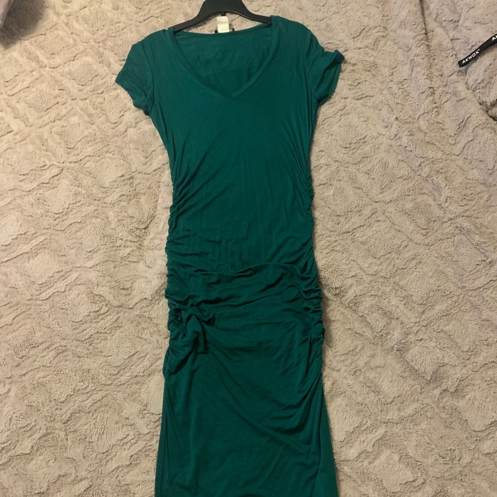 Very flattering- Fitted ruched midi dress